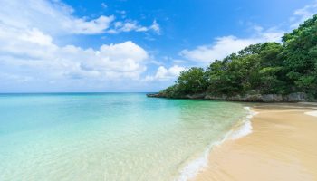 Secluded tropical paradise beach with clear blue lagoon water, Ishigaki Island, Okinawa, Japan.