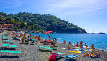 people gather on Bonassola beach