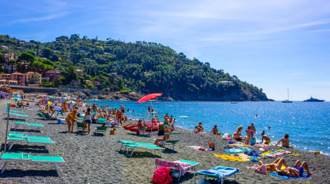 people gather on Bonassola beach